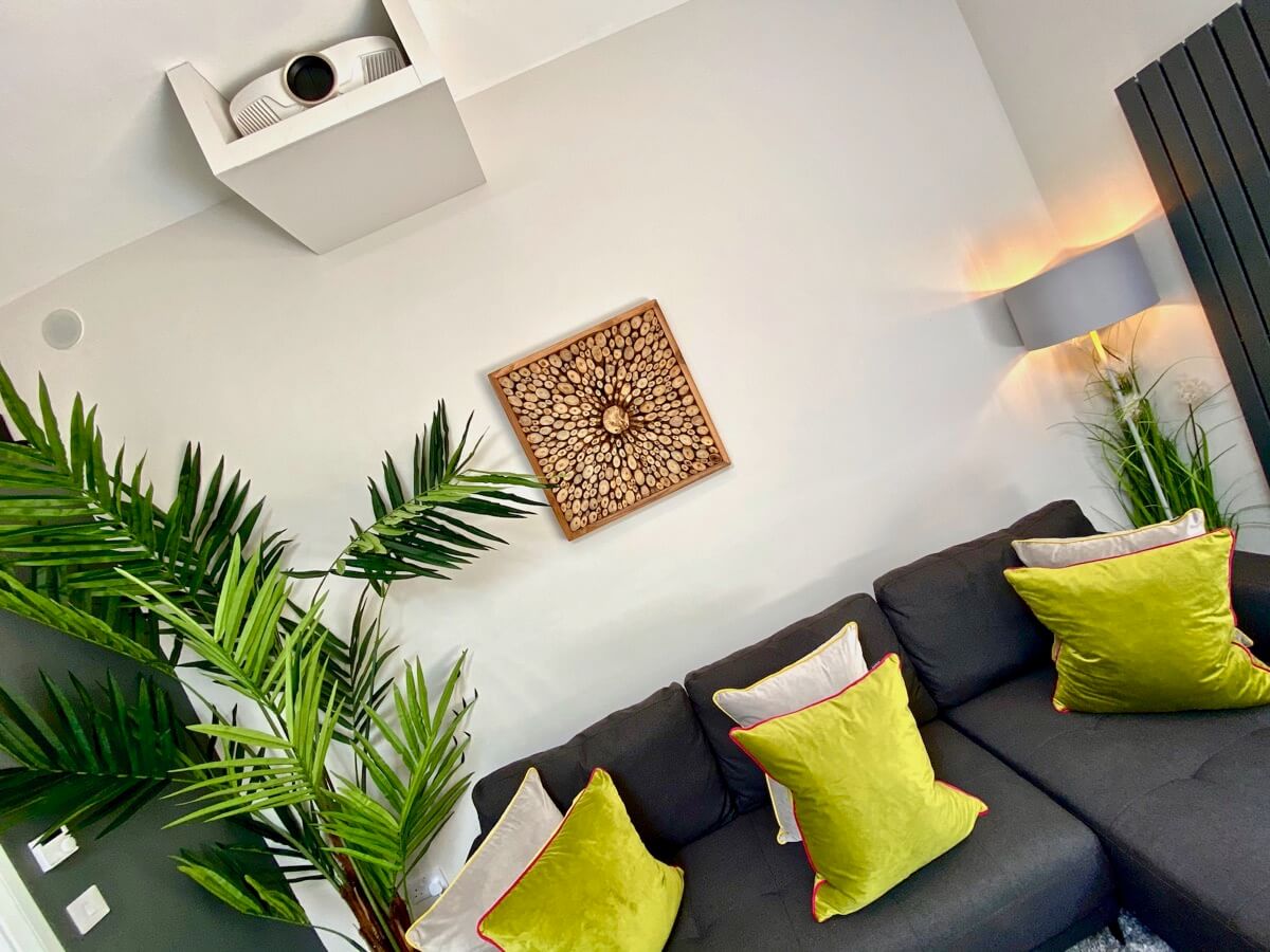 Sunridge cubes sofa with green cushions