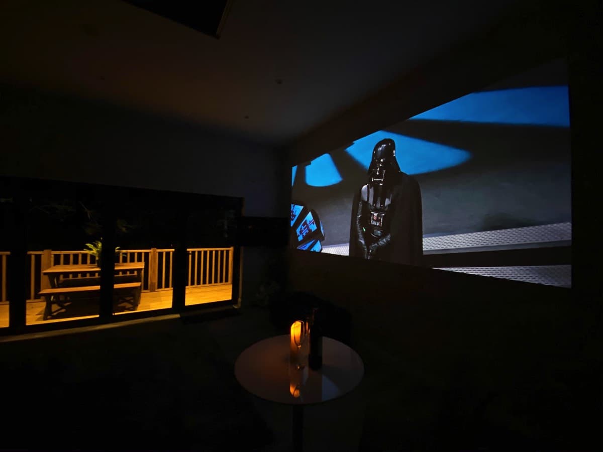 Private cinema room with high-quality projection in the Sunridge Cubes - Sunridge Retreats